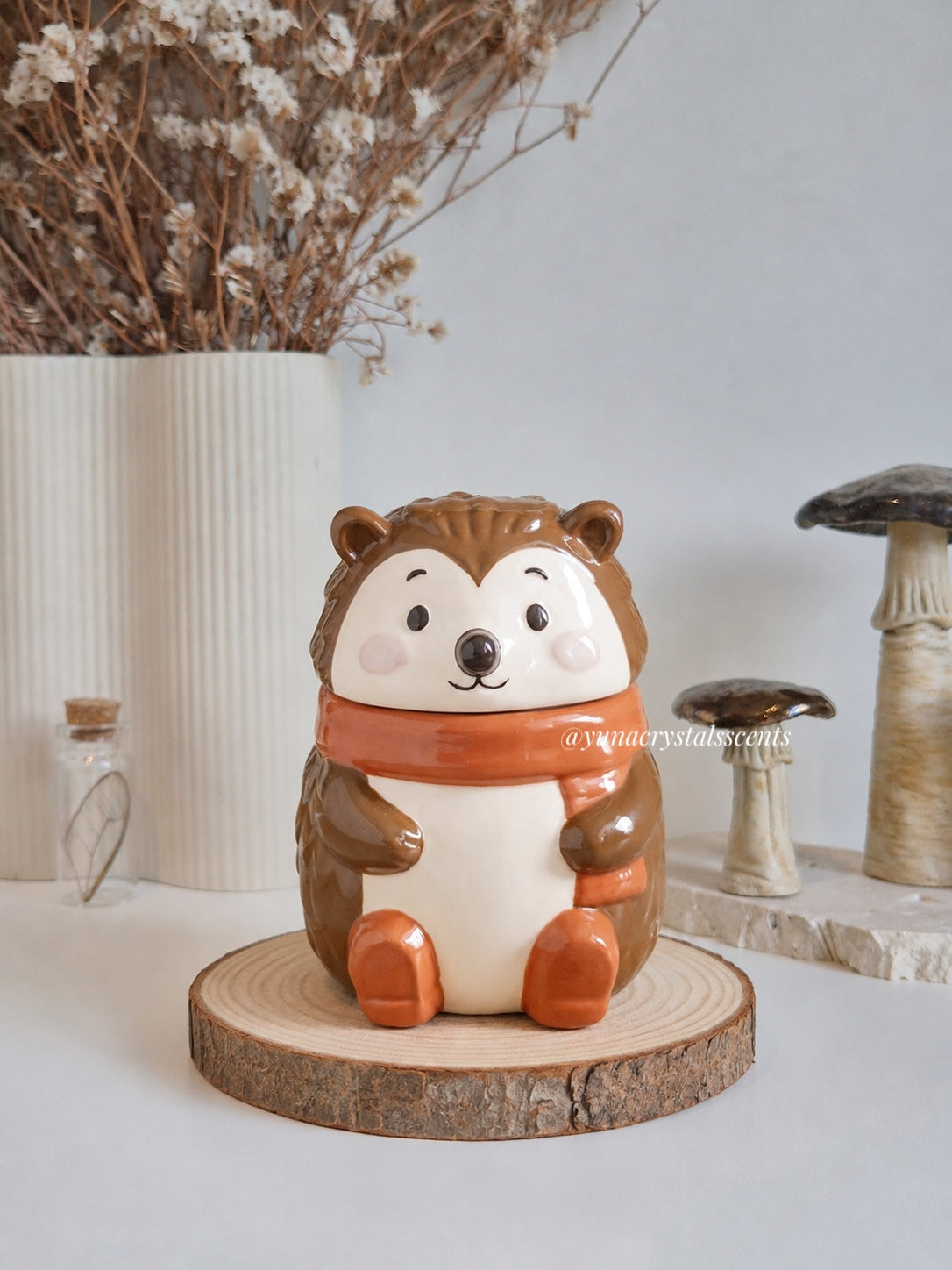 Ceramic hedgehog wax melt burner wearing a scarf
